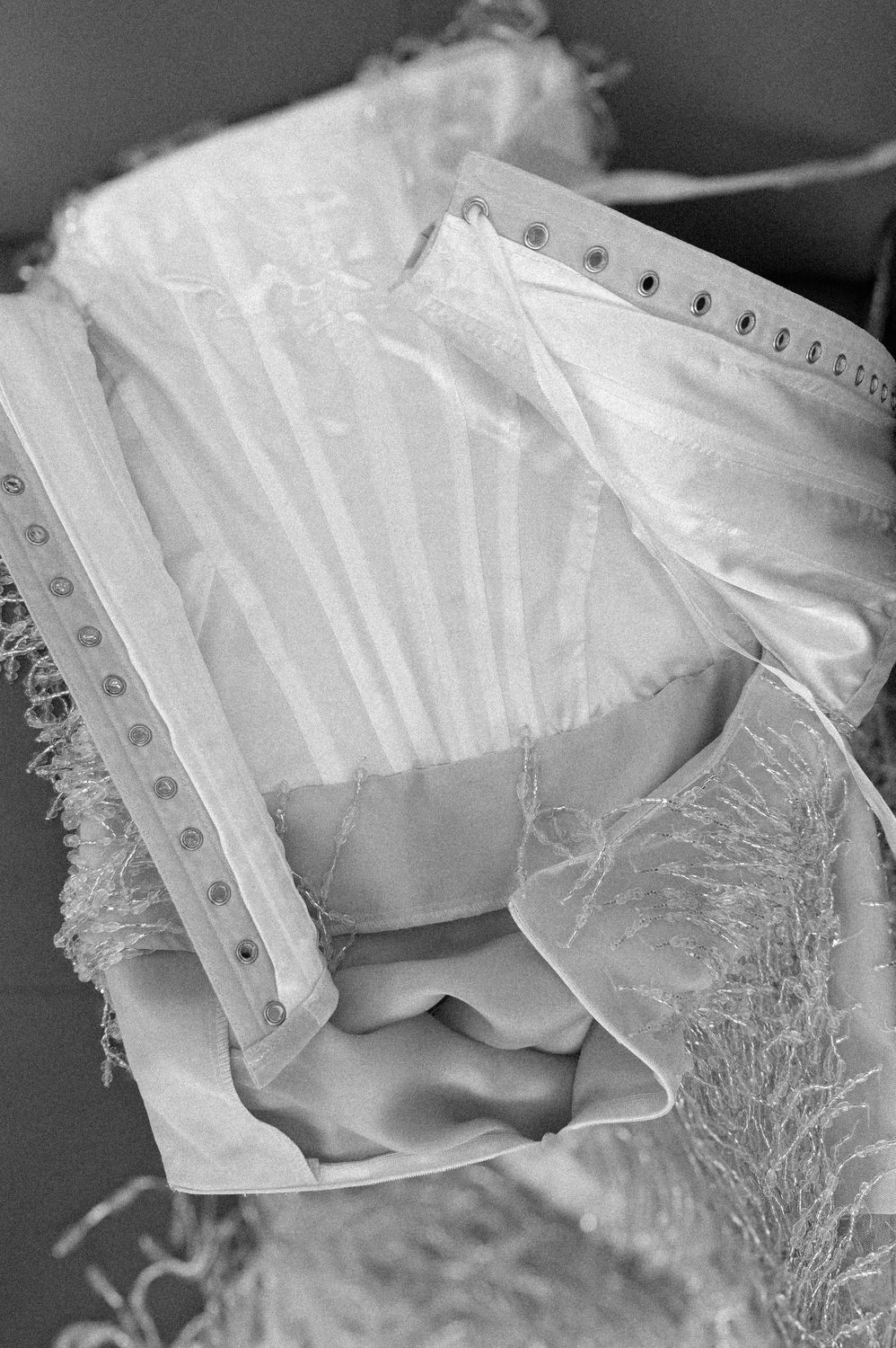 Inside a corset: boning, eyelets and crystal fringe