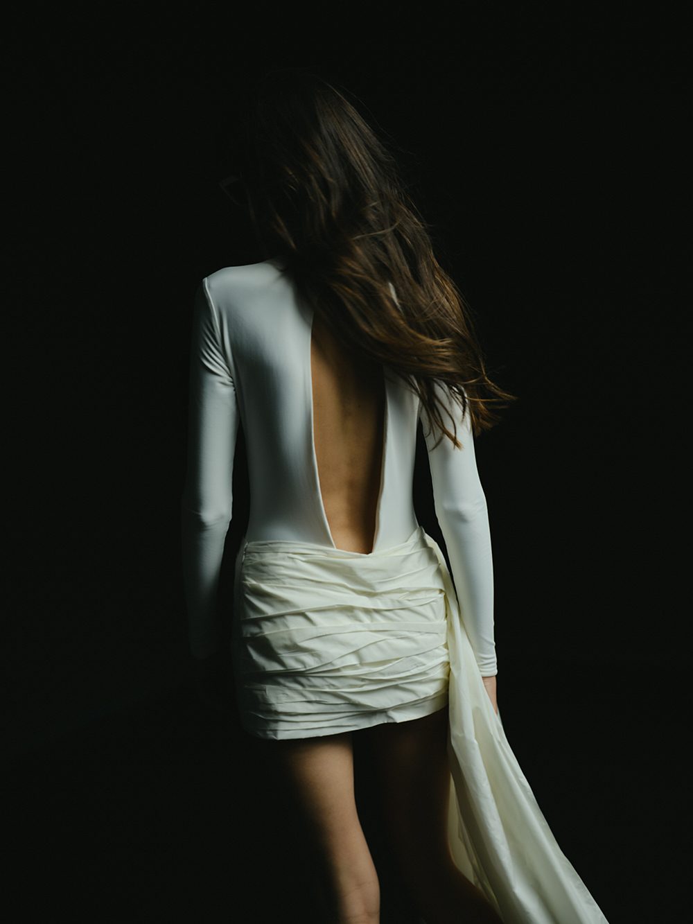 The After: open-back dress, walking away