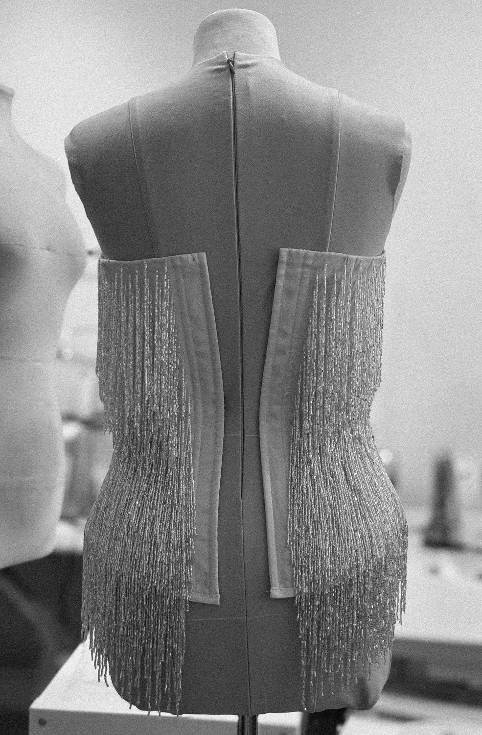 Crystal fringe panels on the form, back