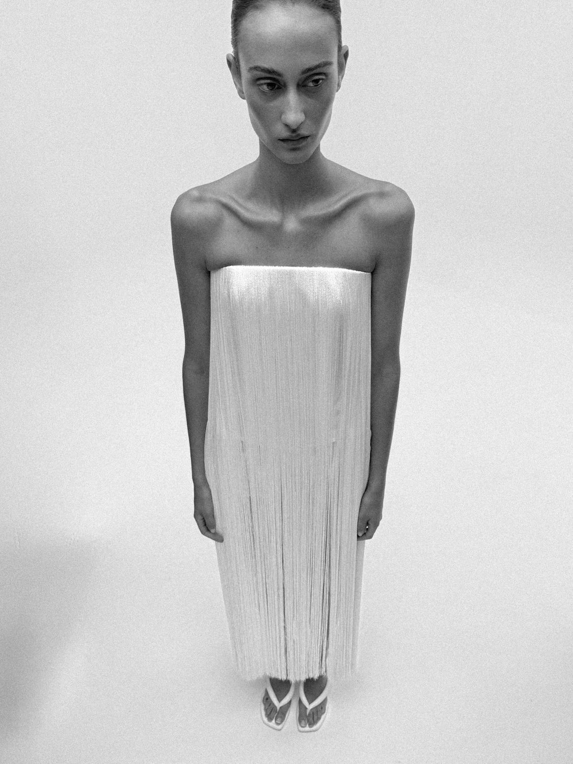 WOMANZE archive, Object 006: Boned taffeta corset with acetate fringe